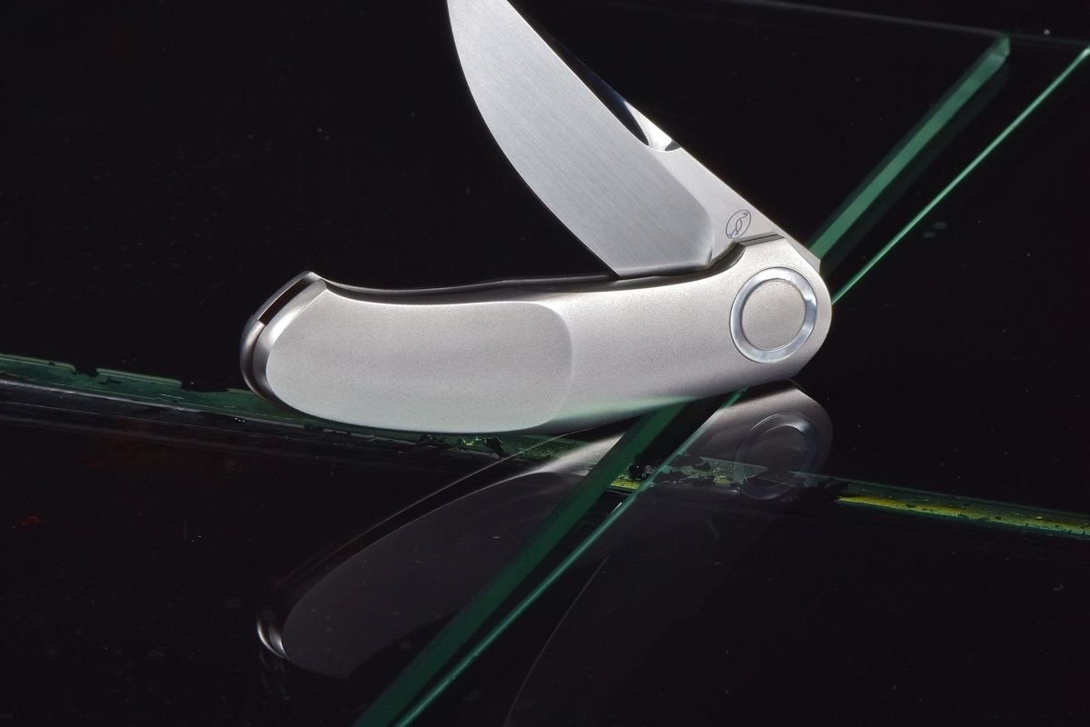 Stainless steel folding pocket knife (representative photo, not the exact product)