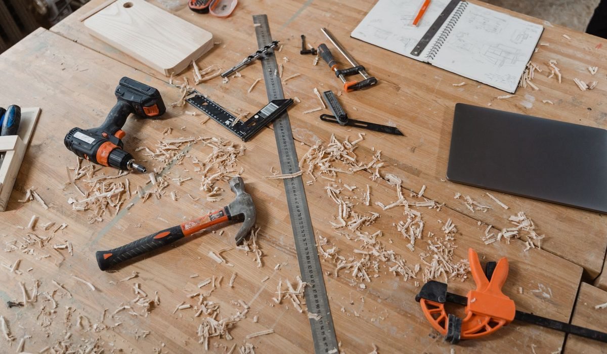 Woodworking and carpentry tools on a wooden workbench