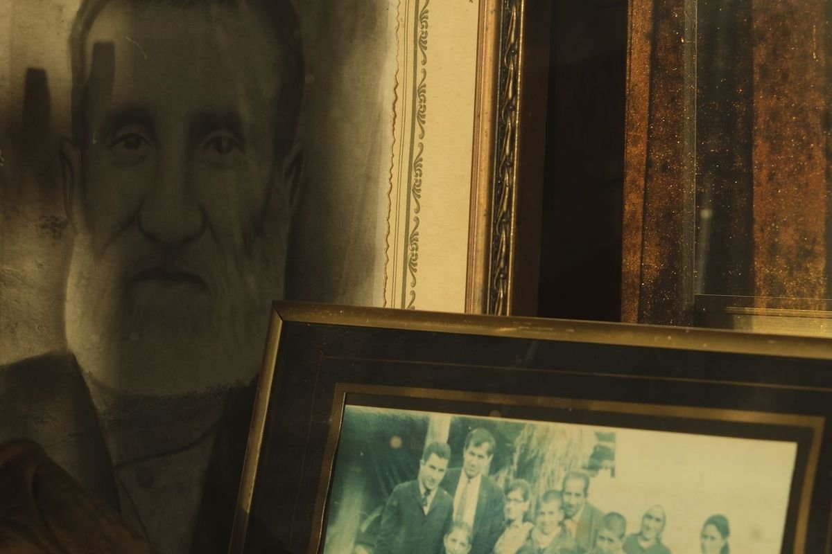 Framed vintage family portraits (representative photo, not the exact product)