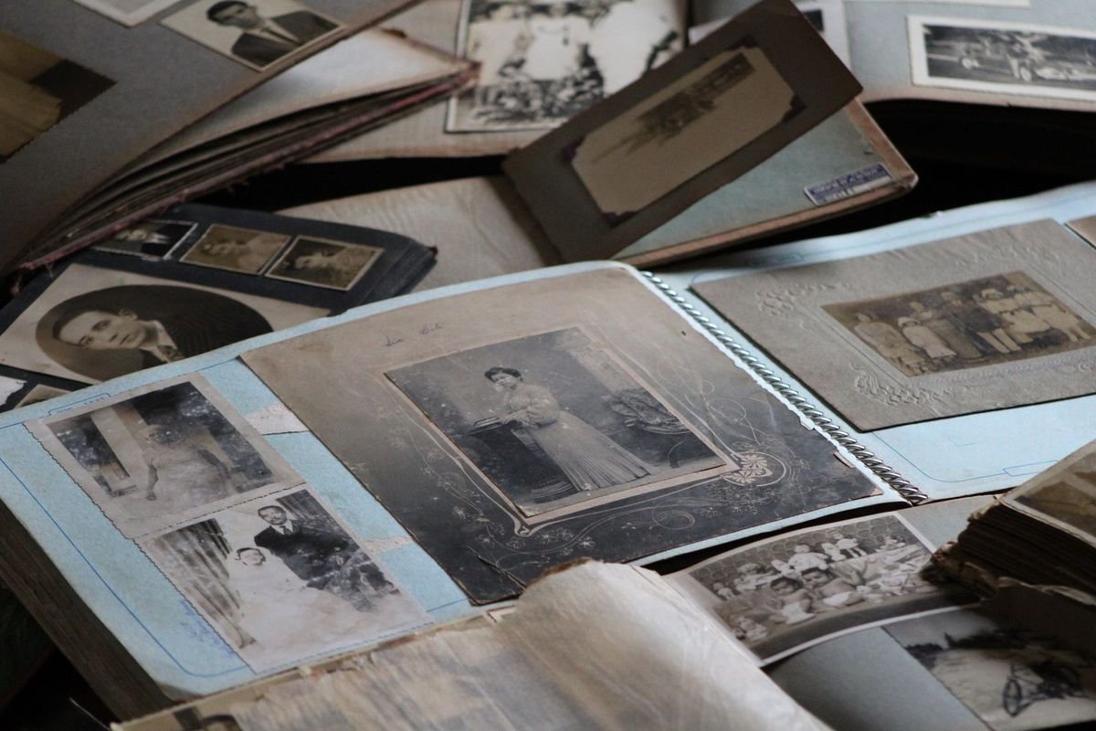 Old family photos in an album (representative photo, not the exact product)