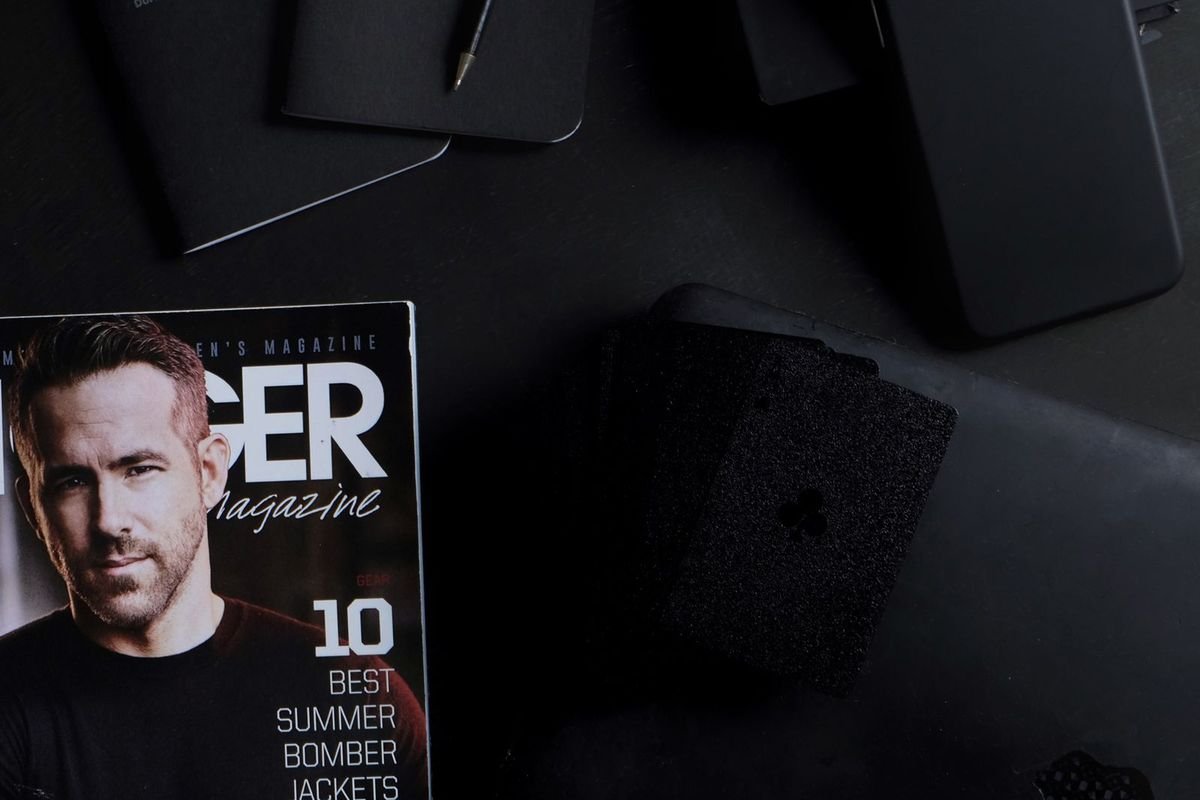 Black pocket notebooks on a desk (representative photo, not the exact product)