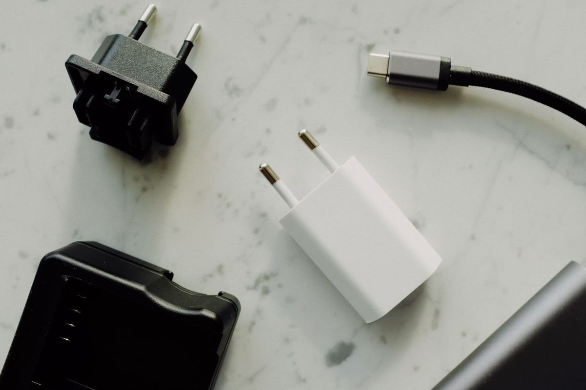 Charger and cable on a white surface (representative photo, not the exact product)