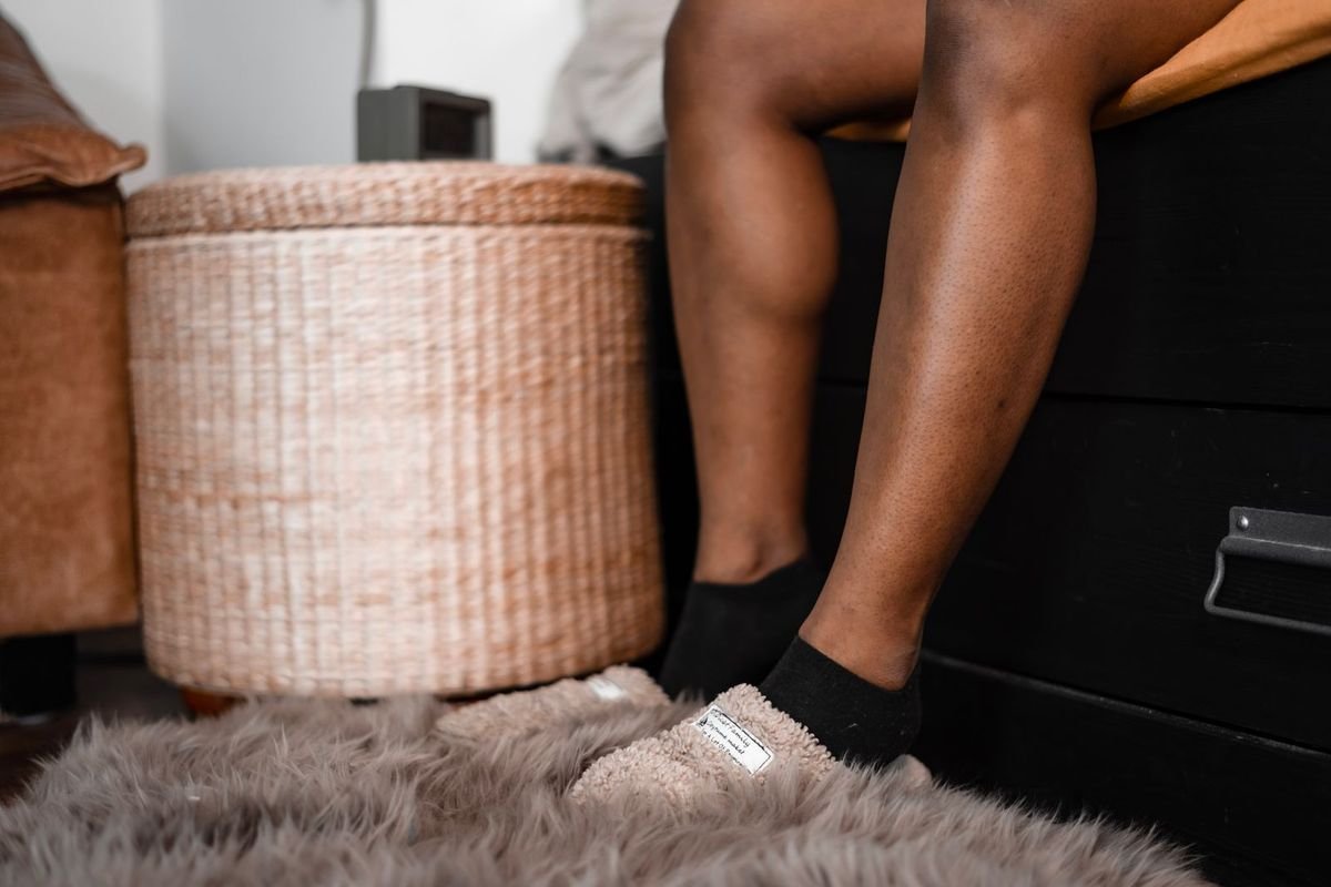 Feet in socks and fluffy slippers (representative photo, not the exact product)