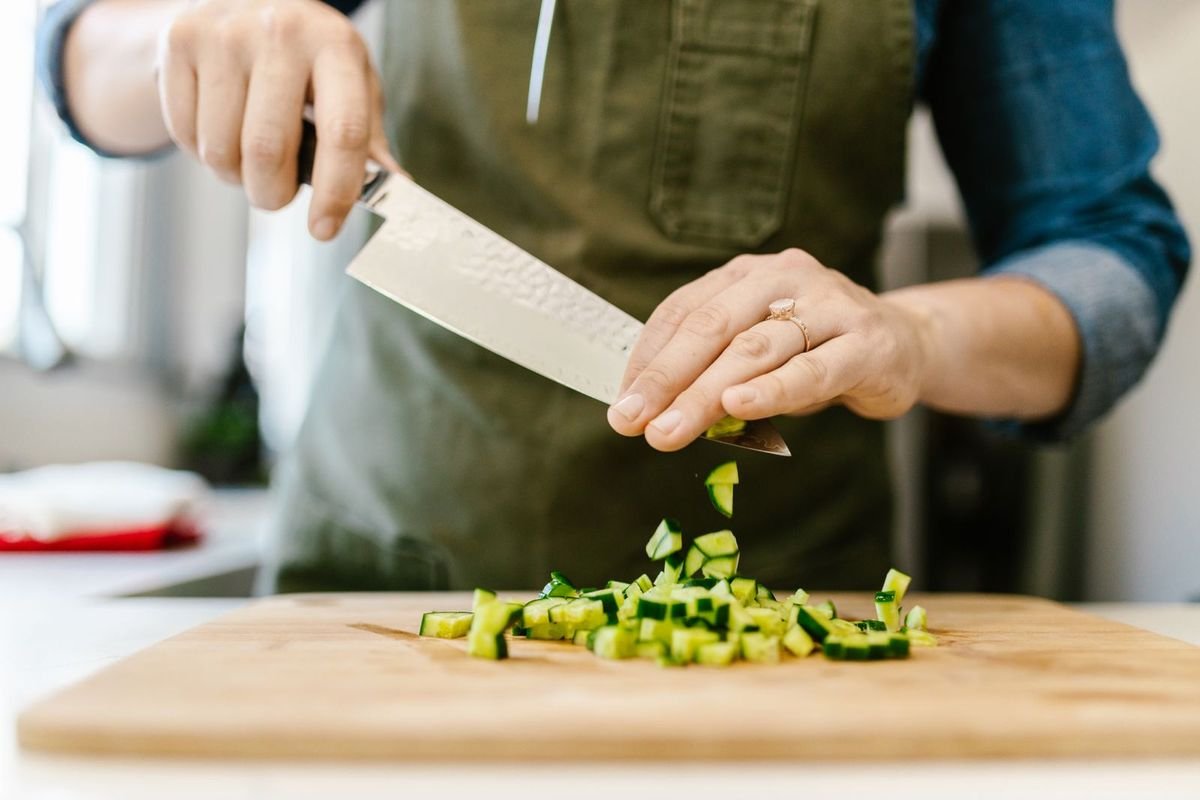 Chef cutting vegetables with a knife (representative photo, not the exact product)
