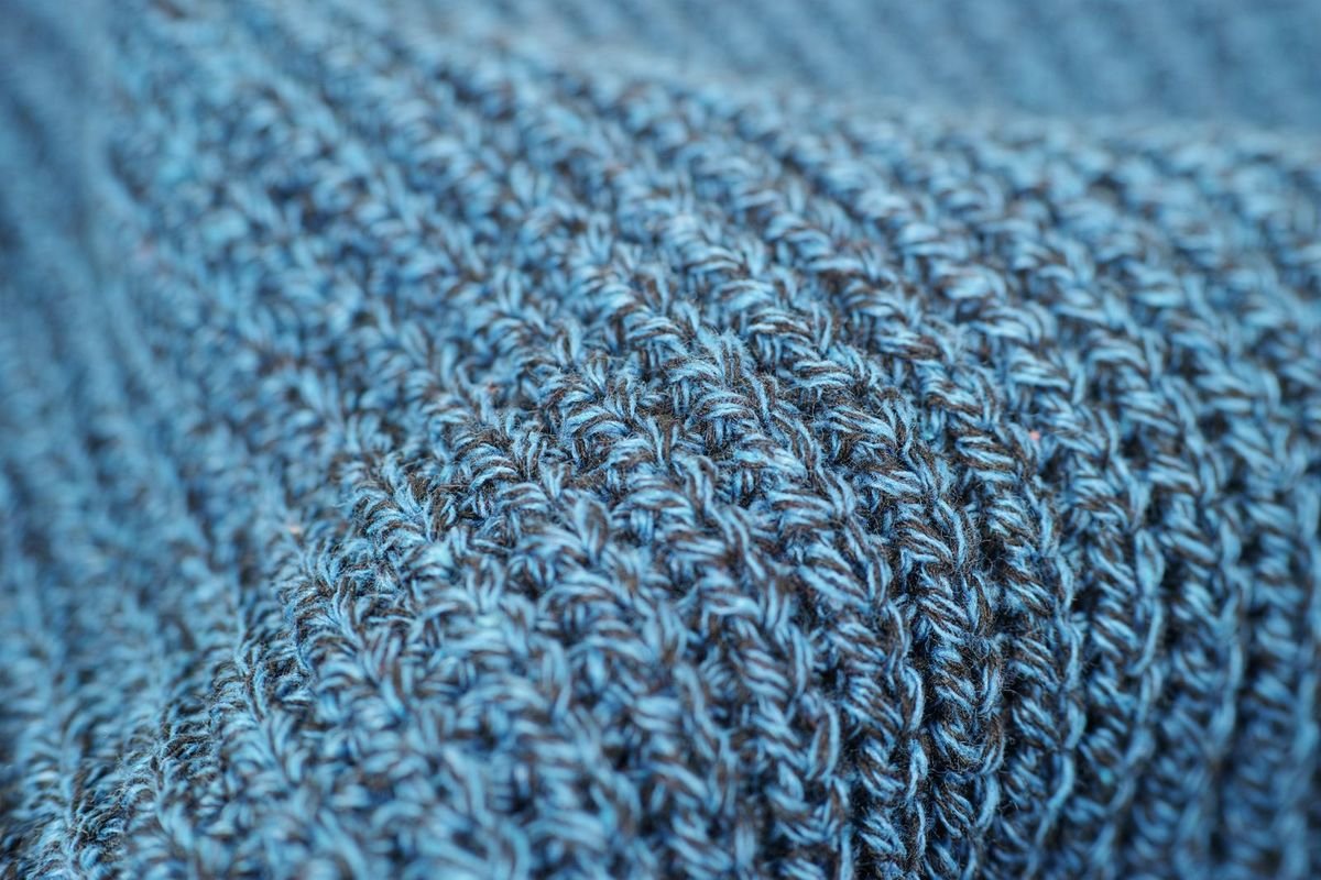 Close-up of gray knit fabric (representative photo, not the exact product)